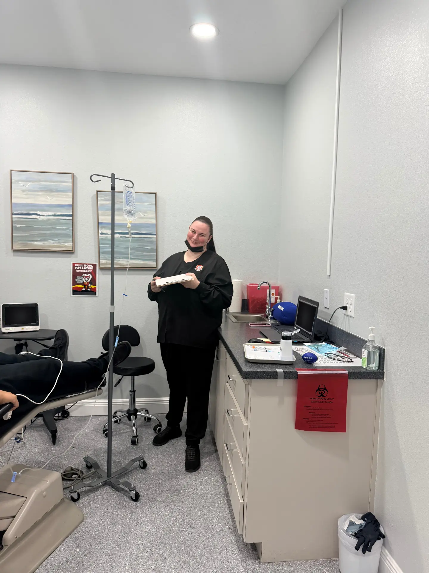 Staff member preparing the sedation treatment room at the Just Pull It Zephyrhills office